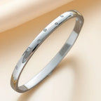 Pulseira rígida Lumière de mulher em aço inoxidável com zircónias MotionCare — vista 2